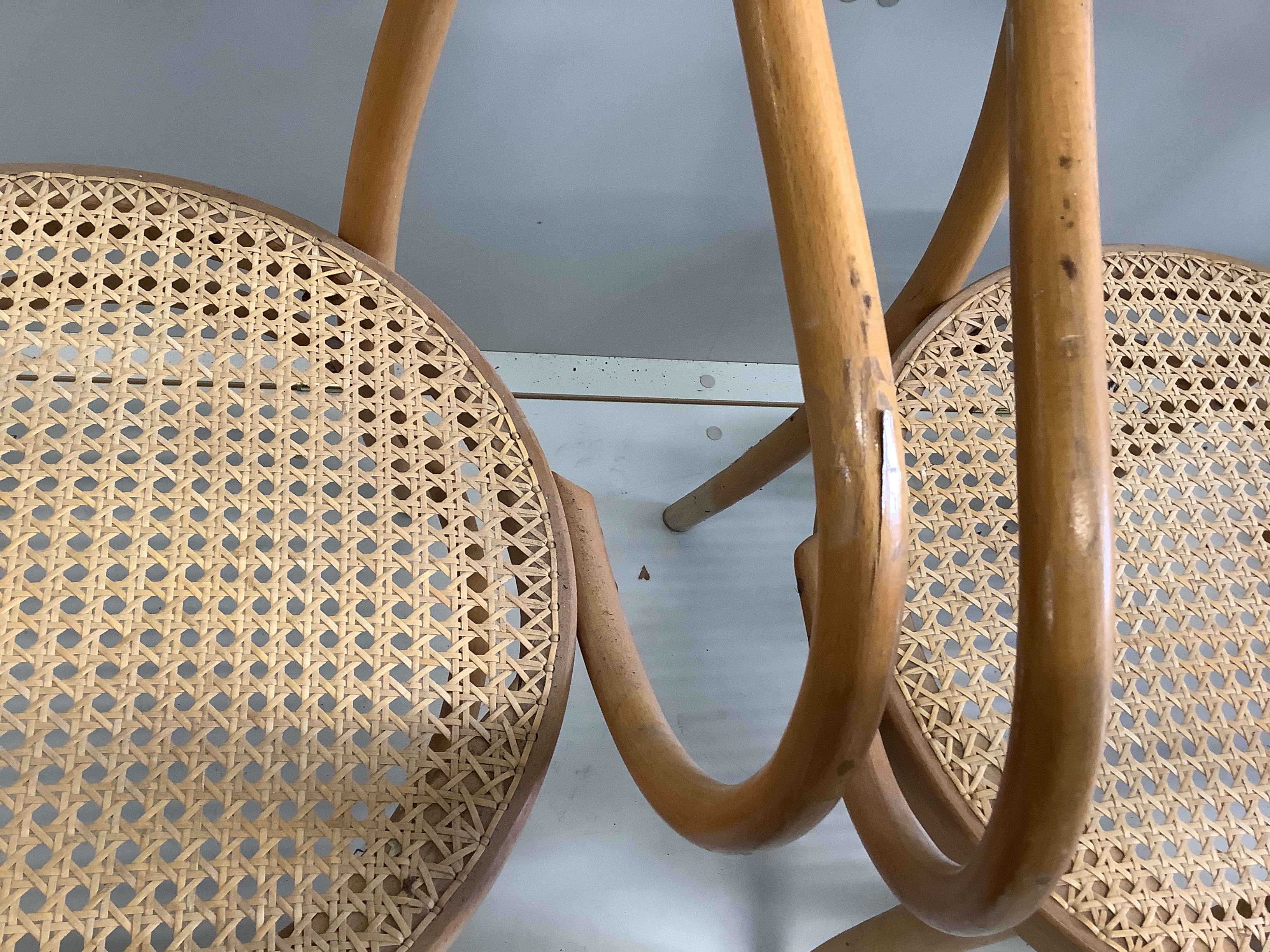 Six cane seat bentwood elbow chairs, width 58cm, depth 47cm, height 85cm